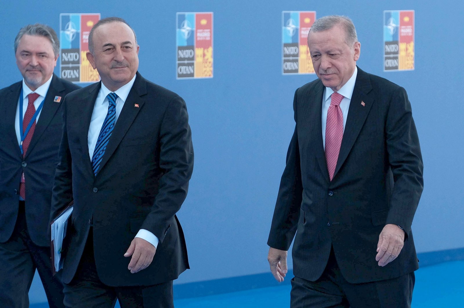 President Recep Tayyip Erdoğan, accompanied by Foreign Minister Mevlüt Çavuşoğlu, arrives to attend the first day of the NATO Summit in Madrid, Spain, June 29, 2022. (EPA)