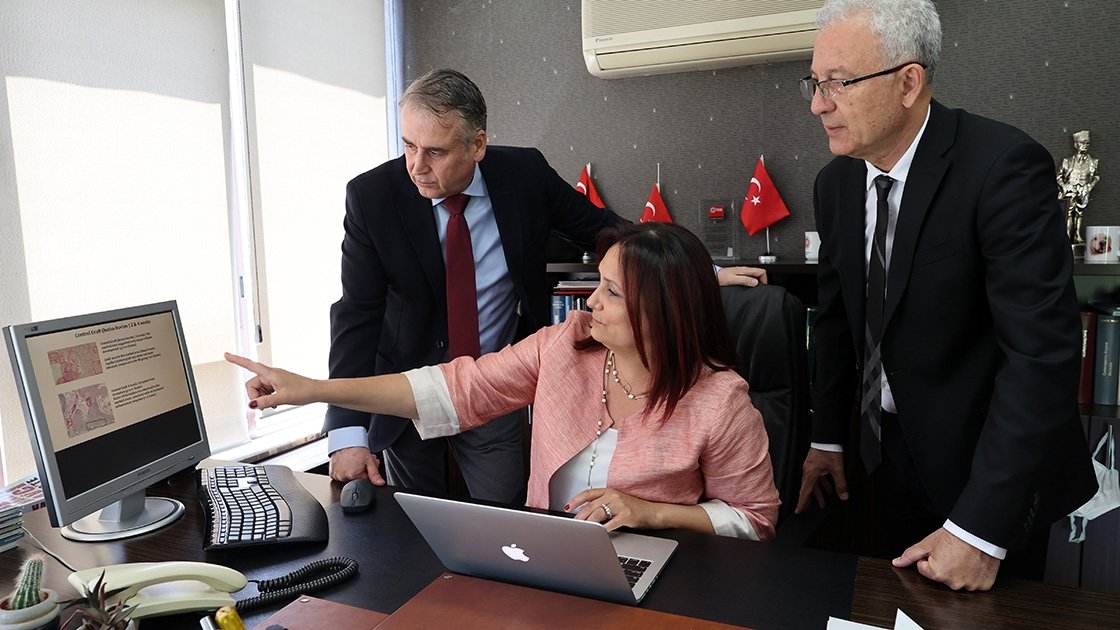 Professors Aylin Sepici Dinçel (C) and Altay Uludamar (L) and Dr. Erdal Ergunol (R) in their office, in the capital Ankara, Turkey, July 4, 2022. (AA PHOTO)