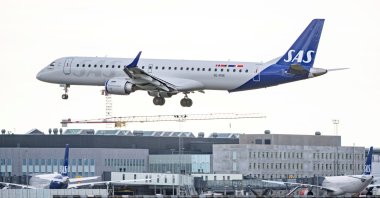 SAS Link's Embraer E195 aircraft lands at Kastrup Airport, as pilots of Scandinavian Airlines go on strike, in Kastrup, Denmark, July 4, 2022. (Reuters Photo)
