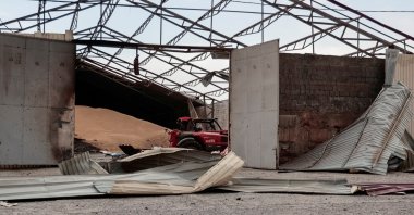 Seeds are seen in a grain silo destroyed after it was shelled repeatedly, amid Russia&#039;s invasion of Ukraine, in the Donetsk region, Ukraine, May 31, 2022. (Reuters Photo)
