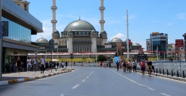 People walk on Taksim Square, in Istanbul, Turkey, June 26, 2022. (DHA PHOTO)