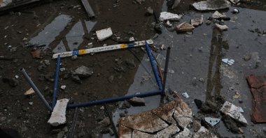 People survey the damage after a sports complex was shelled overnight by Russia, Kharkiv, Ukraine, June 24, 2022. (Reuters Photo)