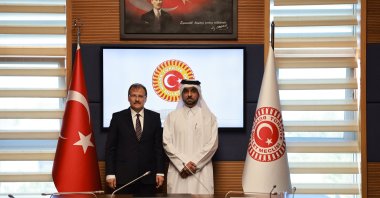 Chair of the Parliamentary Human Rights Investigation Committee Hakan Çavuşoğlu (L) receives Sultan bin Hassan Al Jamali, secretary-general of the Qatar National Human Rights Committee, in the capital Ankara, Turkey, July 5, 2022. (AA)