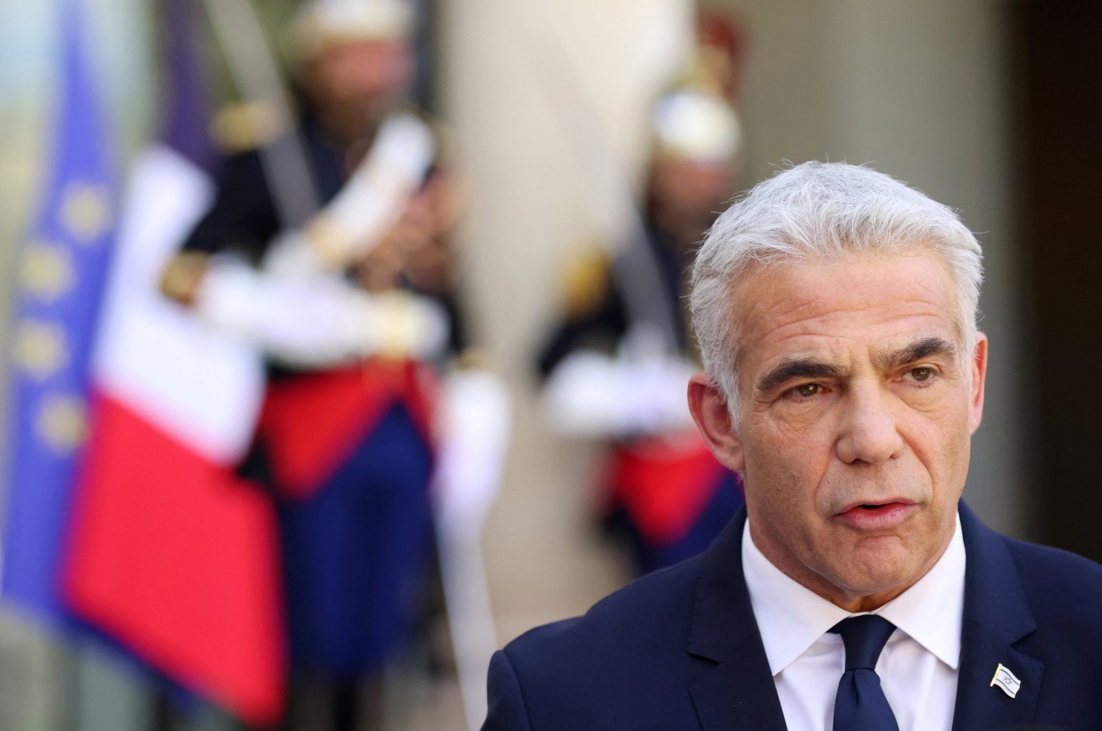 New Israeli Prime Minister Yair Lapid delivers a joint statement with French President Emmanuel Macron (not seen) before a meeting at the Elysee Palace in Paris, France, July 5, 2022. (Reuters Photo)