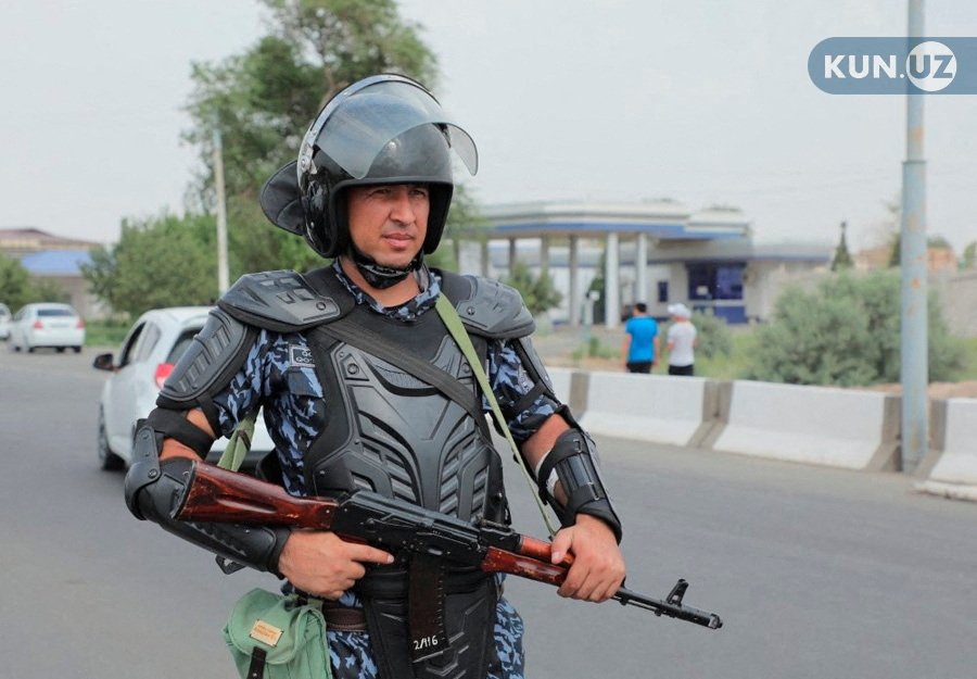 An Uzbek law enforcement officer guards a street in Nukus, capital of the northwestern Karakalpakstan region, Uzbekistan July 3, 2022.  (PHOTO via REUTERS)