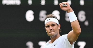 Spain's Rafael Nadal celebrates after winning his men's singles quarterfinal tennis match during the 2022 Wimbledon Championships at The All England Tennis Club in Wimbledon, southwest London, U.K., July 6, 2022. (AFP Photo)