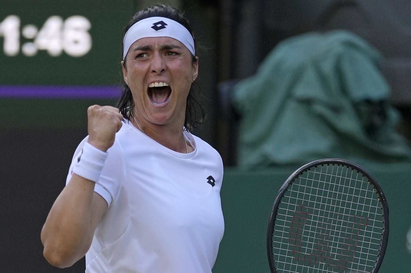Ons Jabeur celebrates after winning a point against Marie Bouzkova in the Wimbledon women&#039;s singles quarterfinal, London, England, July 5, 2022. (AP Photo)