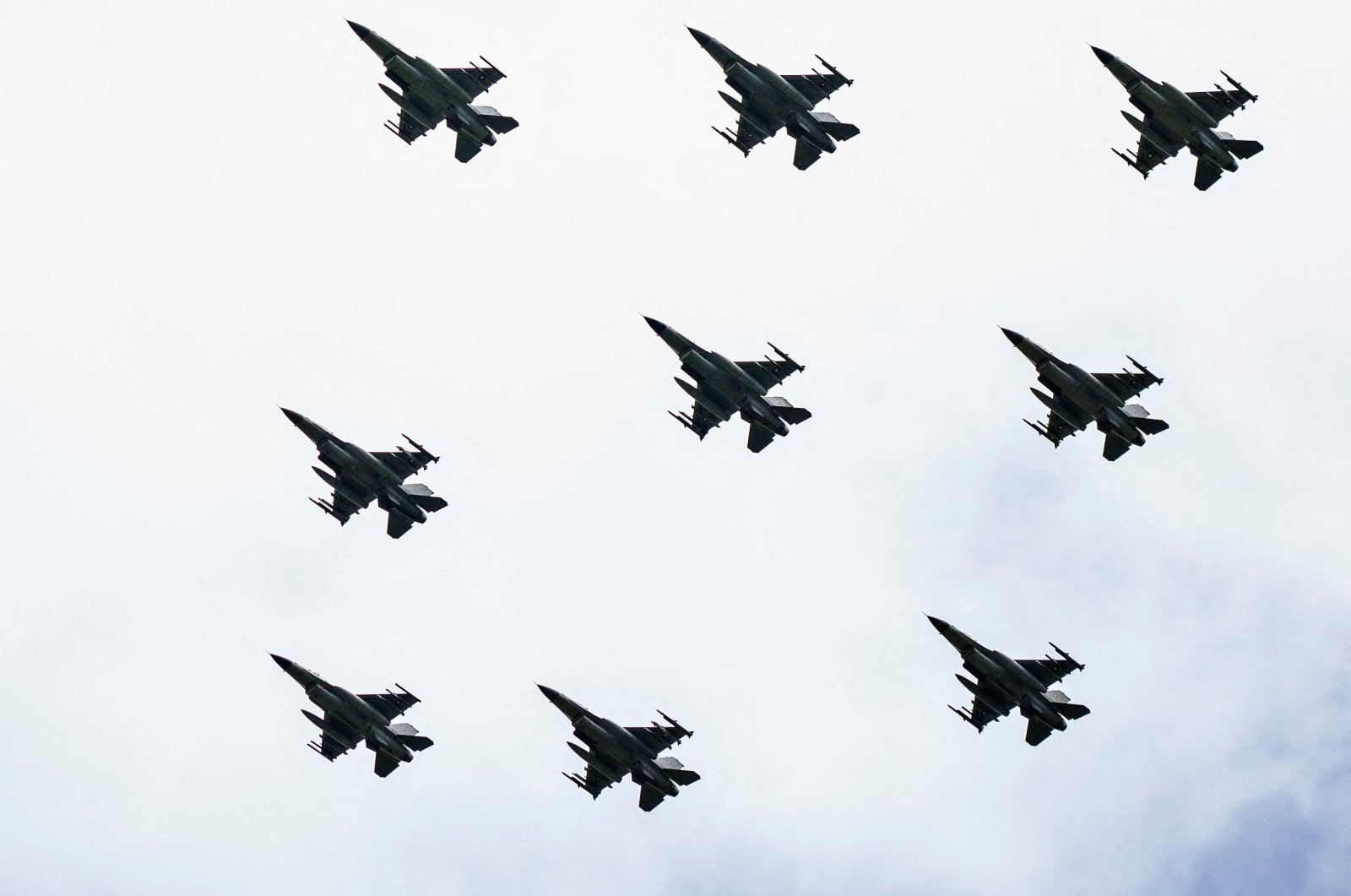 F-16 aircraft fly past in the Danish Air Show at Karup Airport, in Karup, Denmark, June 19, 2022. (Reuters Photo)