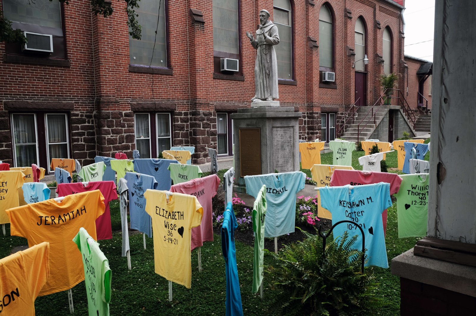 Shirts representing victims of gun violence in Harrisburg are displayed in a memorial at St. Francis Catholic Church, Pennsylvania, U.S., June 22, 2022. (AFP Photo)