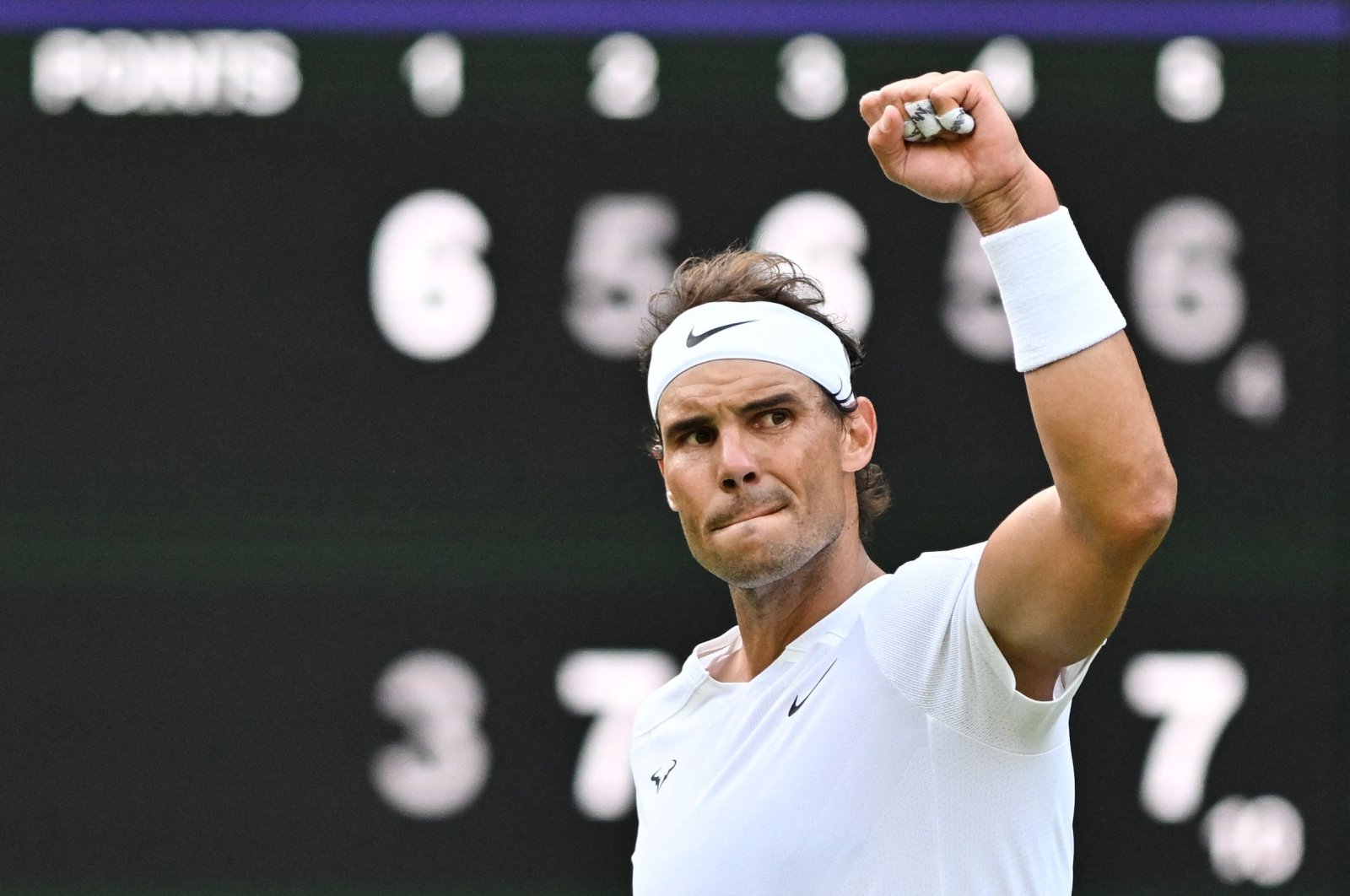 Spain&#039;s Rafael Nadal celebrates after winning his men&#039;s singles quarterfinal tennis match during the 2022 Wimbledon Championships at The All England Tennis Club in Wimbledon, southwest London, U.K., July 6, 2022. (AFP Photo)