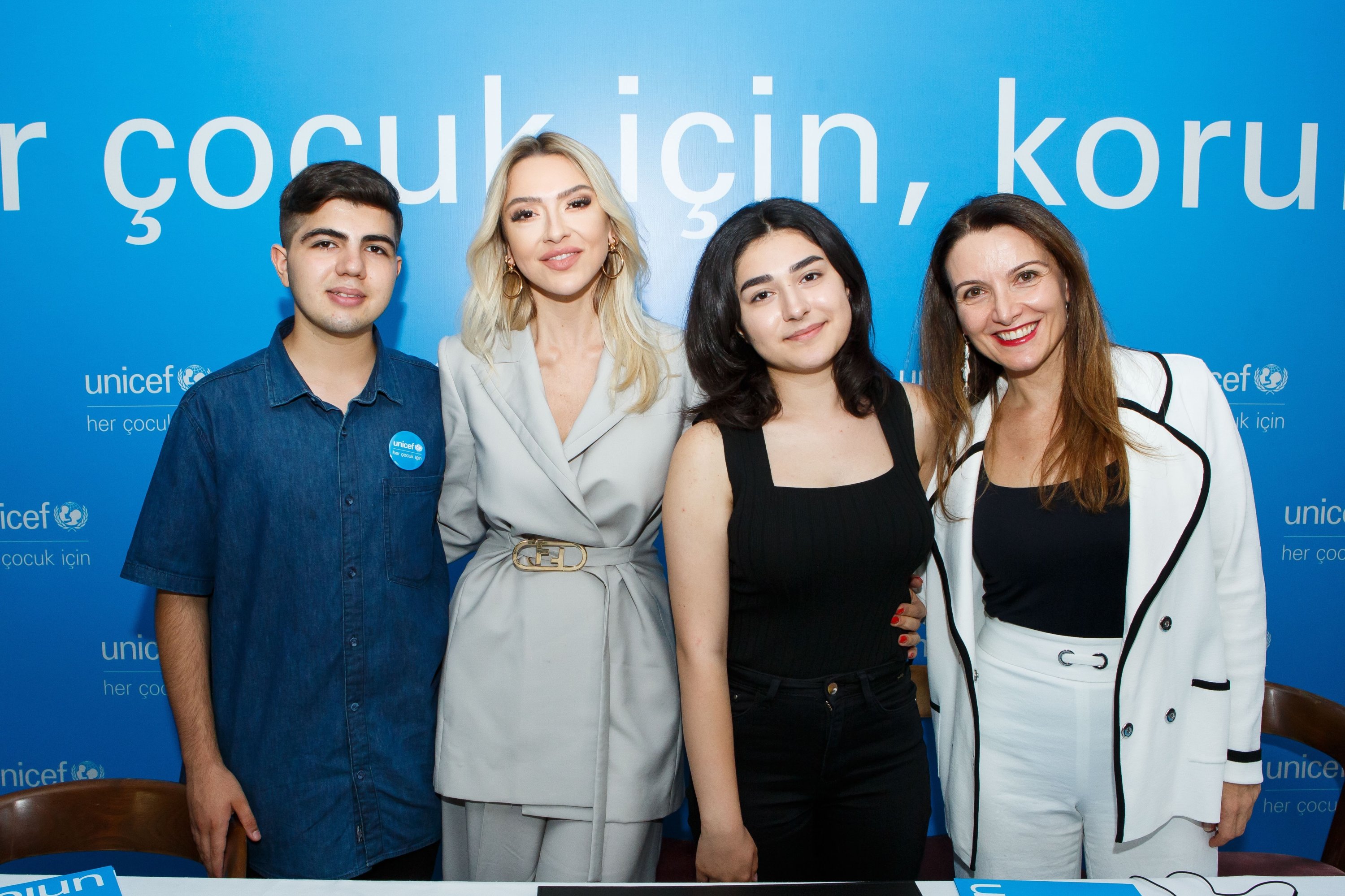 (R-L) UNICEF Representative to Turkey Regina De Dominicis, young participant Nehir, singer Hadise, and other young participant Resul, Istanbul, Turkey, July 7, 2022. (Photo courtesy of UNICEF Turkey)