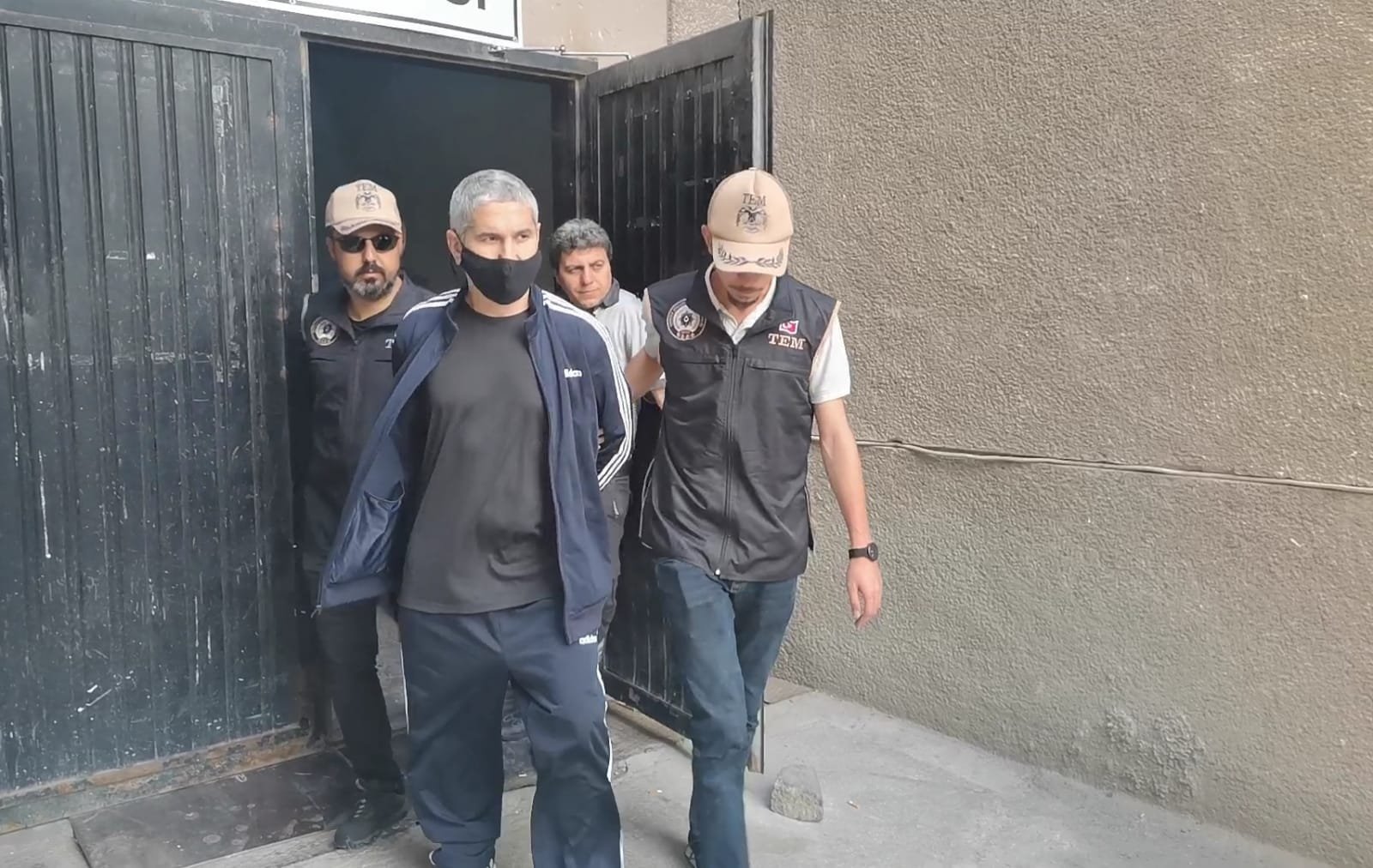 Security forces escort Mehmet Gezer after a court hearing in Turkey&#039;s capital Ankara, July 7, 2022. (DHA Photo)