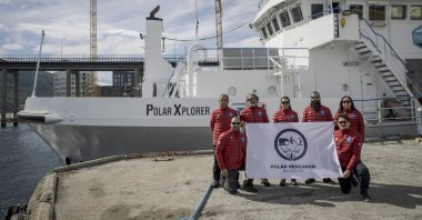 The Turkish team poses in front of the research vessel, in Tromso, Norway, July 7, 2022. (AA PHOTO)
