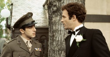 This image released by Paramount Pictures shows Al Pacino as Michael Corleone (L) and James Caan as Sonny Corleone in a scene from &quot;The Godfather.&quot; Caan died Wednesday, July 6, 2022, at age 82.  (Paramount Pictures via AP)