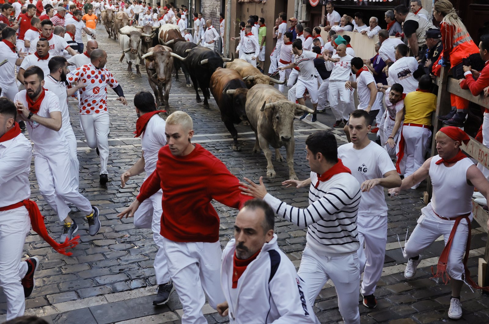 People take part in the traditional Running of the Bulls, Pamplona, Spain, July 7, 2022. (EPA Photo)