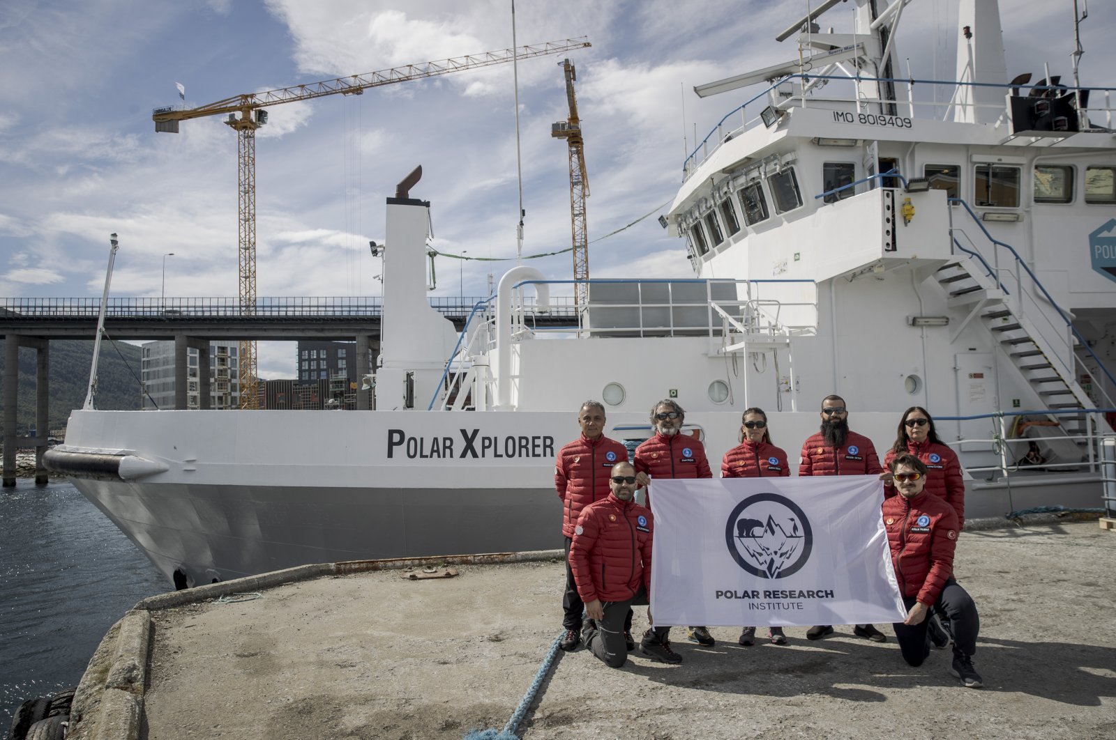 The Turkish team poses in front of the research vessel, in Tromso, Norway, July 7, 2022. (AA PHOTO)