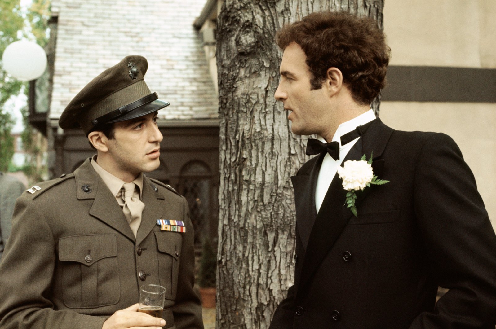 This image released by Paramount Pictures shows Al Pacino as Michael Corleone (L) and James Caan as Sonny Corleone in a scene from &quot;The Godfather.&quot; Caan died Wednesday, July 6, 2022, at age 82.  (Paramount Pictures via AP)