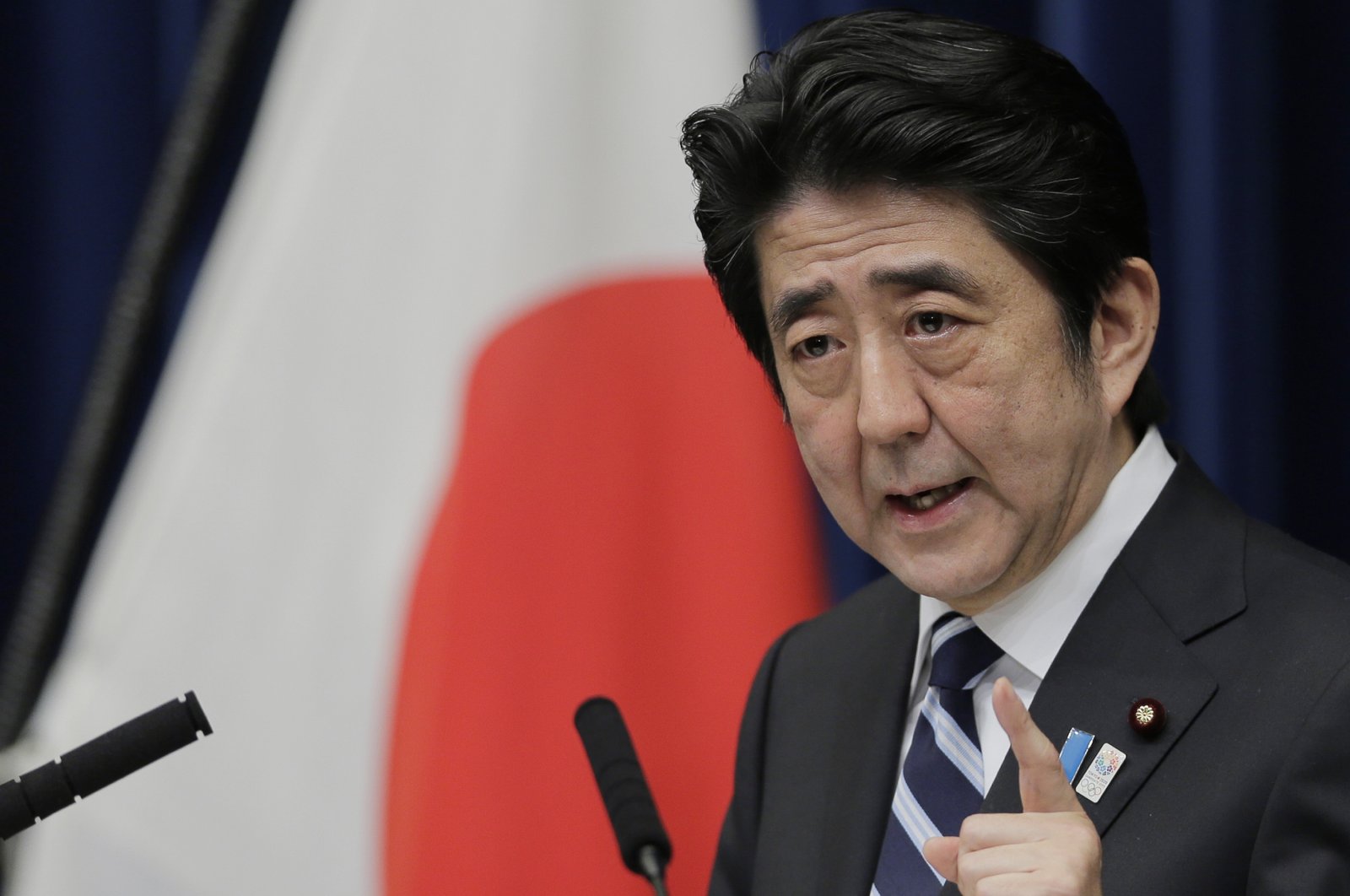 FILE - Then Japanese Prime Minister Shinzo Abe speaks during a news conference on Trans-Pacific Partnership or TPP at his official residence in Tokyo, Friday, March 15, 2013. Former Japanese Prime Minister Abe, a divisive arch-conservative and one of his nation's most powerful and influential figures, has died after being shot during a campaign speech Friday, July 8, 2022, in western Japan, hospital officials said. (AP Photo/Itsuo Inouye, File)