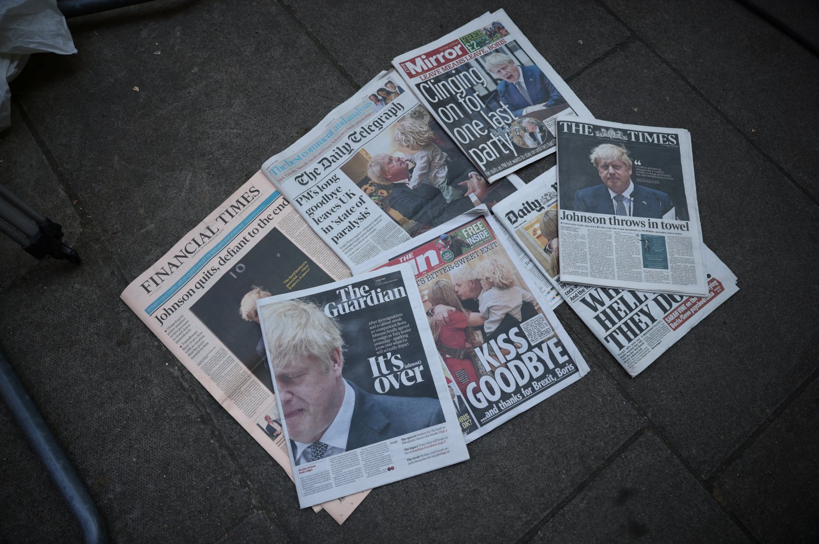 Newspapers reporting the resignation of Boris Johnson are seen on the floor at Downing Street in London, Britain, July 8, 2022. (Reuters Photo)