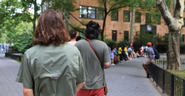 People wait in line to enter the Chelsea Sexual Health Clinic, New York City, U.S., July 8, 2022. (AFP Photo)