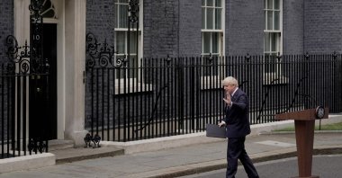 Britain&#039;s Prime Minister Boris Johnson waves after making a statement in front of 10 Downing Street in central London, Britain, July 7, 2022. (AFP Photo)