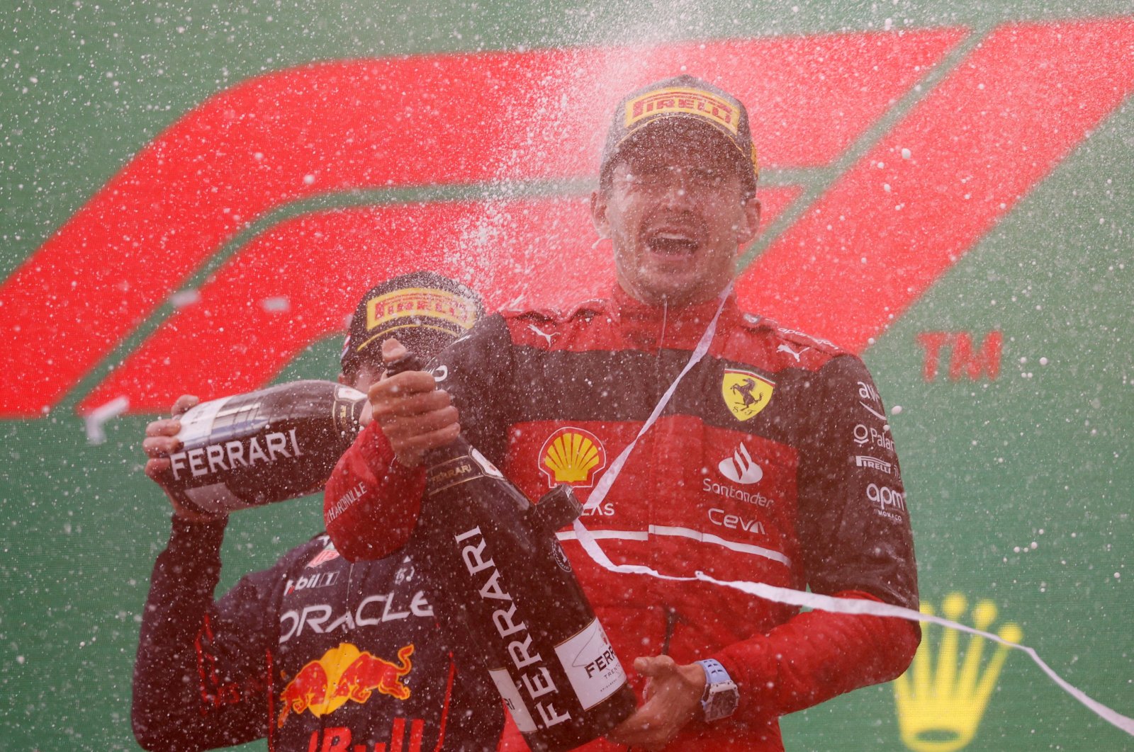 Ferrari&#039;s Charles Leclerc celebrates on the podium after winning the Austrian Grand Prix, Spielberg, Austria, July 10, 2022. (Reuters Photo)