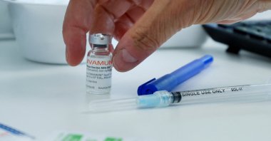 A health care worker prepares a syringe at a monkeypox vaccination clinic in Montreal, Quebec, Canada, June 6, 2022. (Reuters Photo)