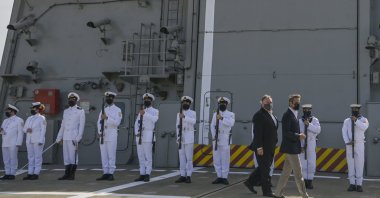 Then-U.S. Secretary of State Mike Pompeo and Greek Prime Minister Kyriakos Mitsotakis visit the Greek frigate Salamis at the Naval Support Activity base at Souda, on the Greek island of Crete, Sept. 29, 2020. (AP Photo)