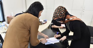 People receive services at a notary public in Ankara, Turkey, June 29, 2022. (IHA Photo)