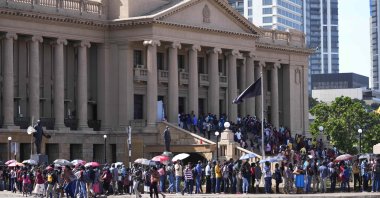 People line up to enter the office of President Gotabaya Rajapaksa three days after it was stormed by anti-government protesters in Colombo, Sri Lanka, July 12, 2022. (AP Photo)