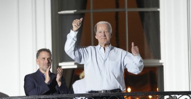 U.S. President Joe Biden (C) gestures as he and Hunter Biden (L) watch fireworks from the Truman Balcony of the White House in Washington, D.C., U.S., July 2022. (EPA Photo)