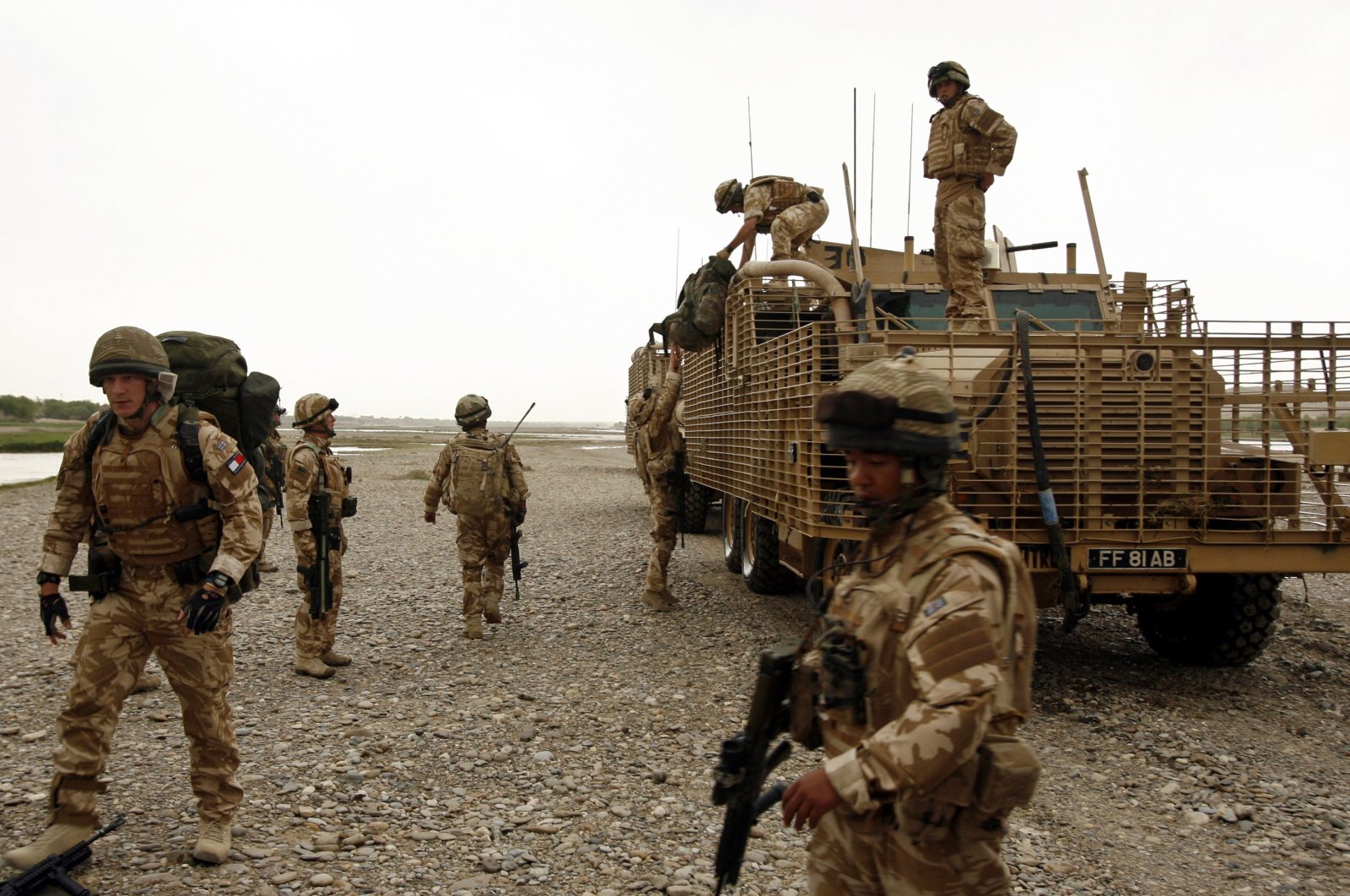 British soldiers patrol in Musa Qala, Helmand province, Afghanistan, March 28,2009. (Afghanistan Military via Reuters)