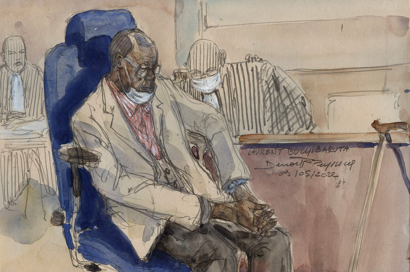 This file court-sketch made on May 9, 2022, shows former senior Rwandan official Laurent Bucyibaruta during his trial on charges of genocide. (AFP Photo)