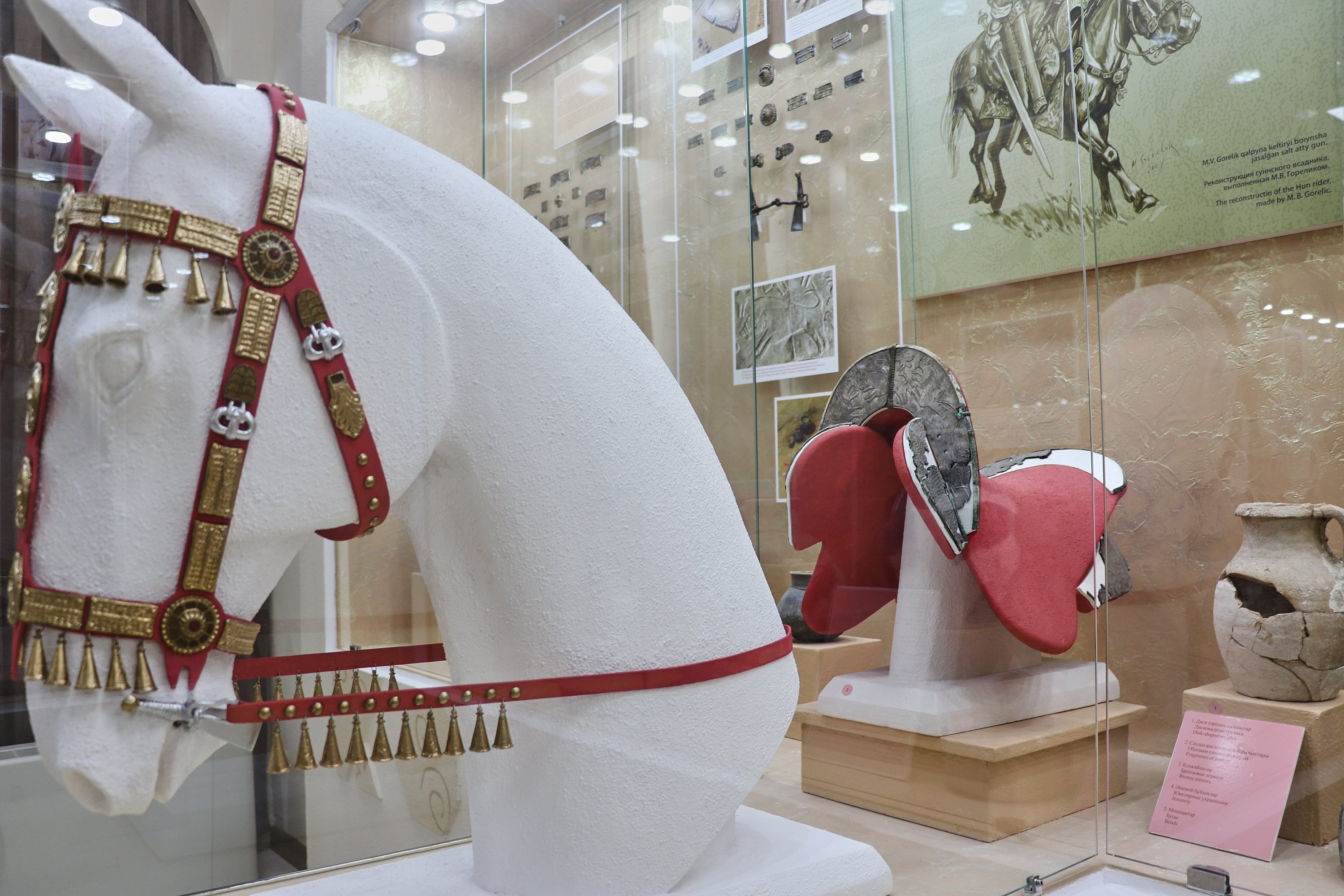 2,000 year-old bridle and saddle made of pure gold and silver belonging to a Hun soldier are exhibited in the Abiş Kekilbayev Regional Promotion Museum in Aktau, Kazakhstan, July 11, 2022. (AA Photo)