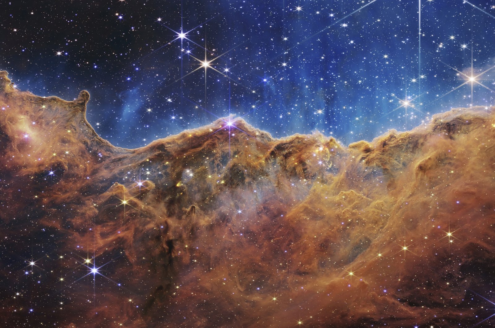 The edge of a nearby, young, star-forming region NGC 3324 in the Carina Nebula, July 12, 2022. (AP Photo)