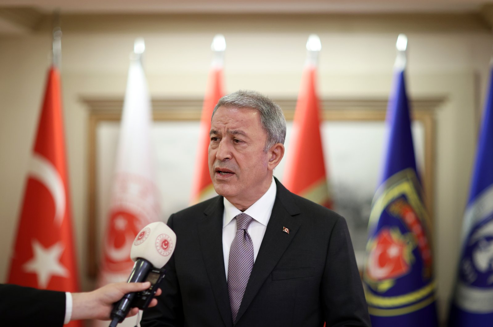 Defense Minister Hulusi Akar speaks to reporters following a four-way meeting in Istanbul, Turkey, Wednesday, July 13, 2022. (AA Photo)