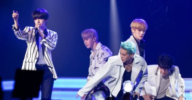 Members of K-pop bands like Monsta X often have the same kind of two-block short-back-and-sides hairstyle, a classic K-pop cut that has even been banned in some Japanese schools. (DPA)