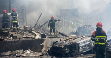 Firefighters work at the site of a Russian military strike, Vinnytsia, Ukraine July 14, 2022. (State Emergency Service of Ukraine via Reuters)