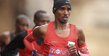 Britain's Mo Farah runs during the London Marathon, London, England, Oct. 4, 2020. (AP Photo)