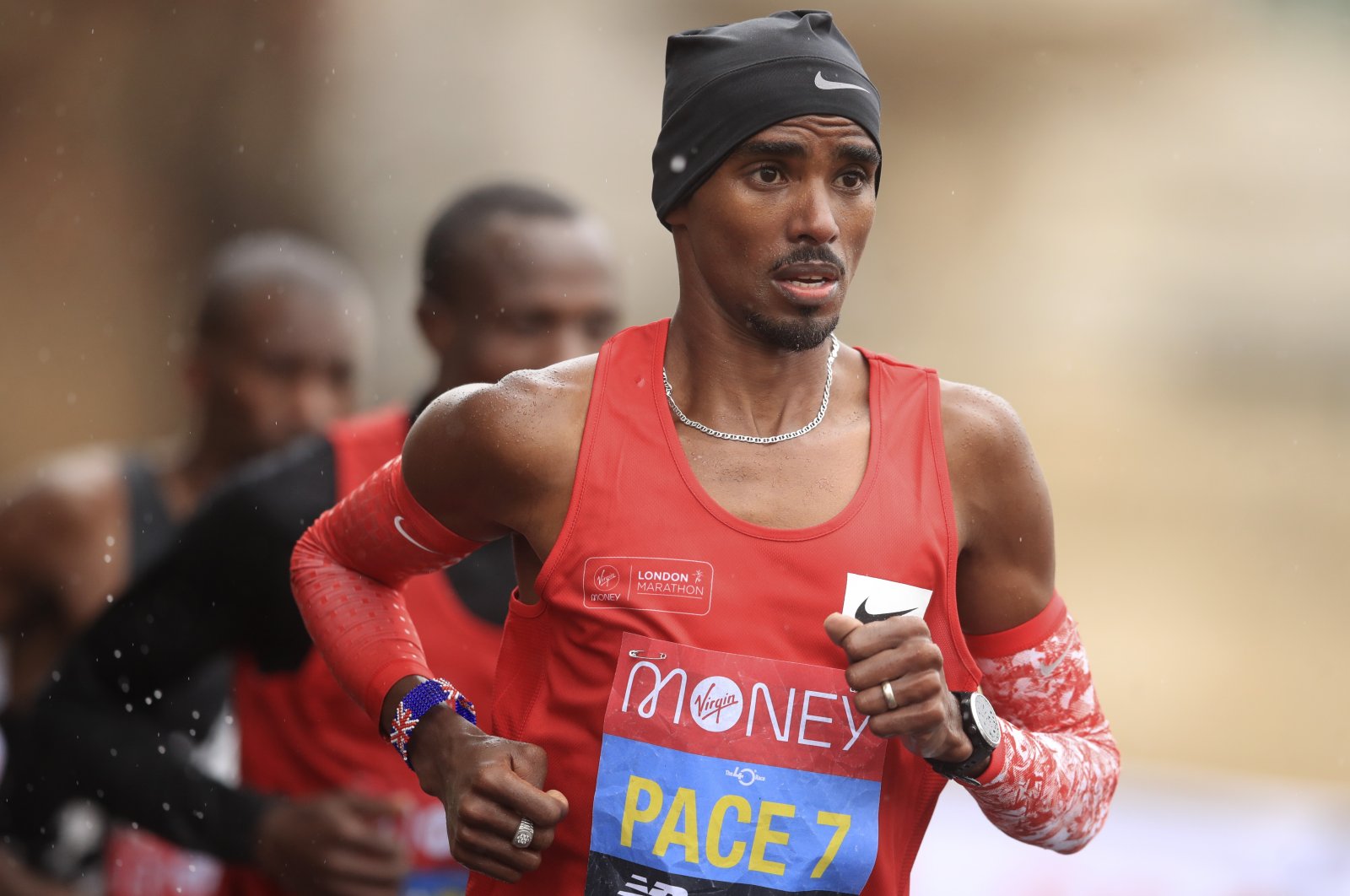 Britain&#039;s Mo Farah runs during the London Marathon, London, England, Oct. 4, 2020. (AP Photo)