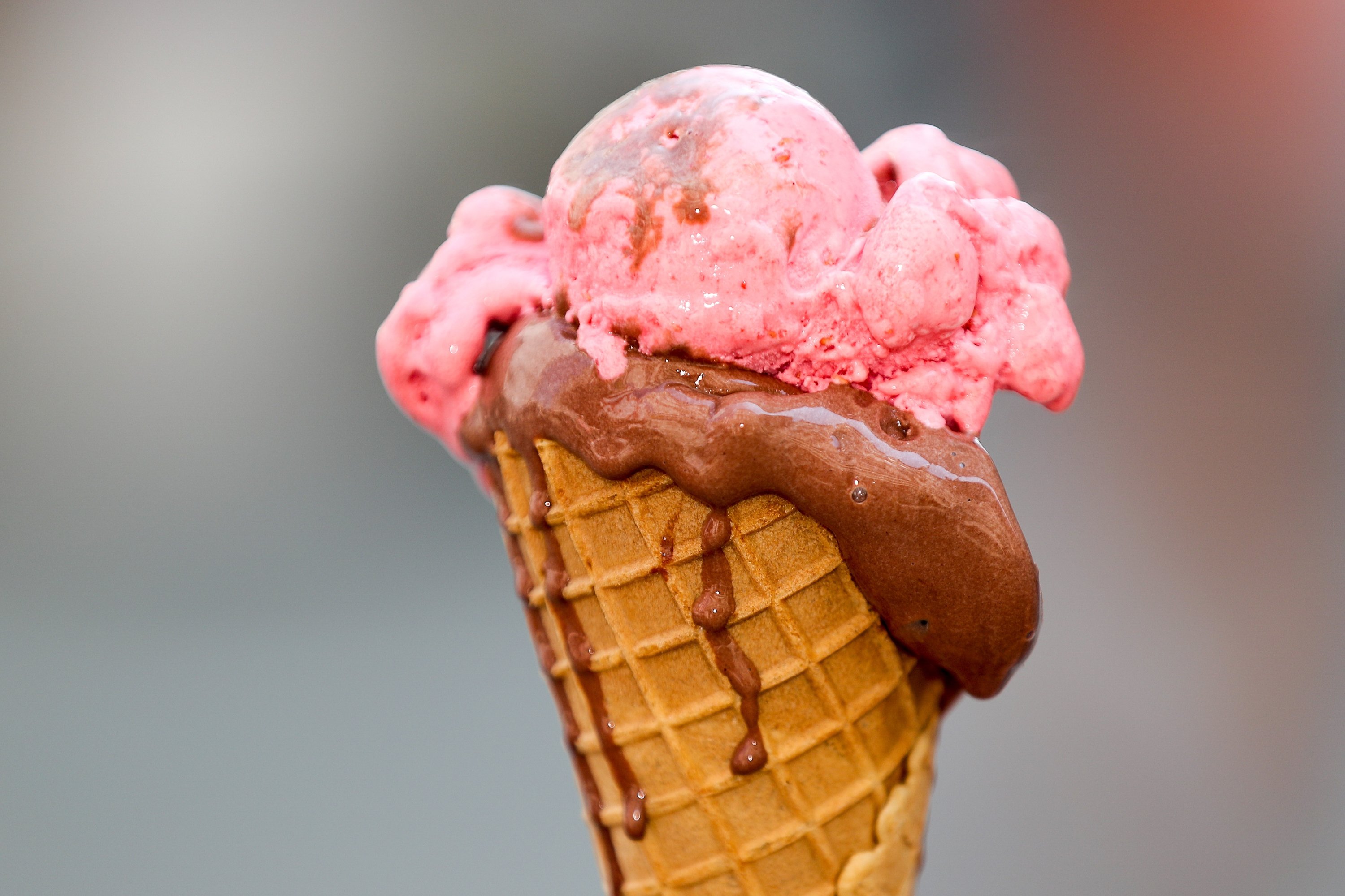 A dripping ice cream with the varieties raspberry and chocolate. The heat wave in Saxony is heading for a new annual record, Leipzig, Germany, July 31, 2018. (DPA Photo)