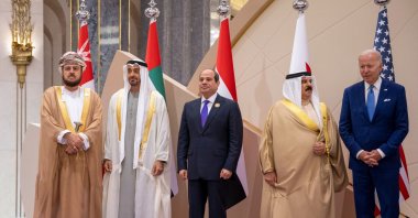 This handout image provided by the UAE Ministry of Presidential Affairs shows (L to R) Oman&#039;s Deputy Prime Minister for International Relations and Cooperation Affairs and the Special Representative of the Sultan Asaad bin Tariq Al Said, UAE President Sheikh Mohamed bin Zayed Al Nahyan, Egypt&#039;s President Abdel-Fattah al-Sissi, Bahrain&#039;s King Hamad bin Isa Al Khalifa and U.S. President Joe Biden posing for a group picture during the Jeddah Security and Development Summit (GCC 3) in the Saudi city of Jeddah on July 16, 2022. (UAE&#039;s Ministry of Presidential Affairs via AFP)