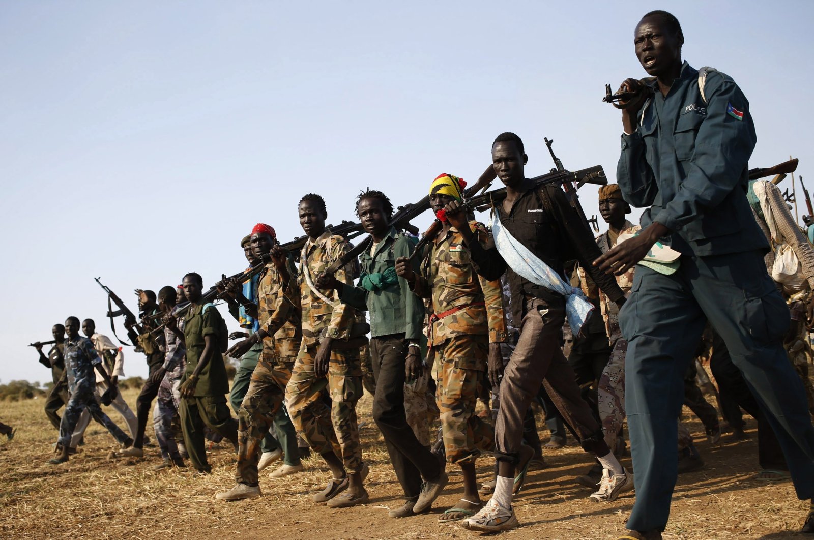 Jikany Nuer White Army fighters, a local youth militia affiliated with the rebels, walk in Upper Nile State, South Sudan, Feb. 12, 2014. (Reuters Photo)