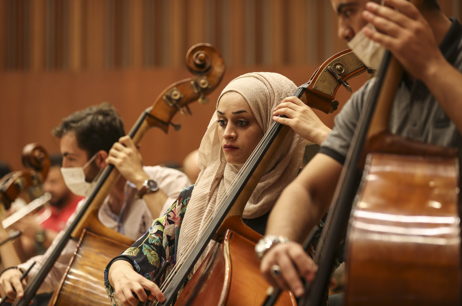 The Palestinian Youth Orchestra, which came to Turkey upon the invitation of first lady Emine Erdoğan, and the symbol of the Palestinian resistance, Mariam Afifi (C), will perform at the Presidential Symphony Orchestra (CSO) on July 19 in the &quot;Palestine-Turkey Peace Concert,&quot; Ankara, Turkey, July 16, 2022. (AA Photo)