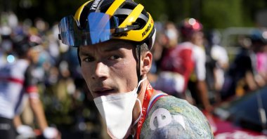 Slovenia&#039;s Primoz Roglic looks on after the 10th stage of the Tour de France, Megeve, France, July 12, 2022. (AP Photo)