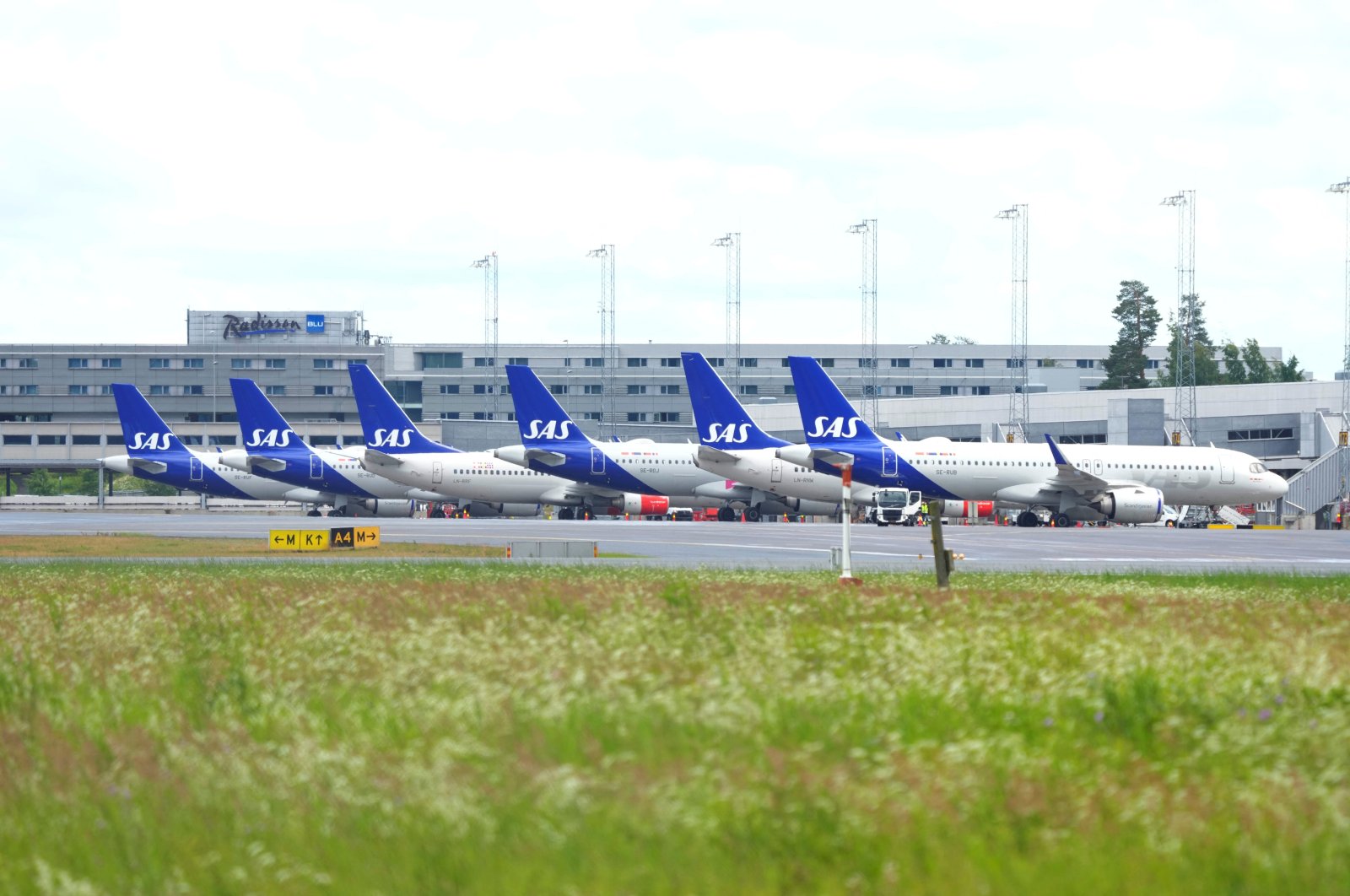 SAS airplanes parked at the Oslo Gardermoen Airport, Norway, July 4, 2022. (Reuters Photo)