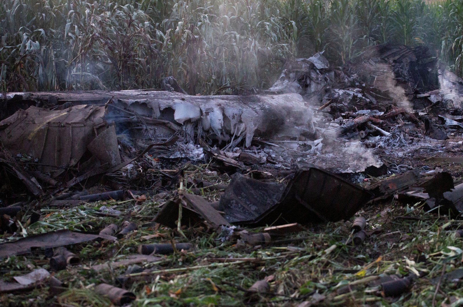 Debris is seen at the crash site of an Antonov An-12 cargo plane owned by a Ukrainian company, near Kavala, Greece, July 17, 2022. (Reuters Photo)