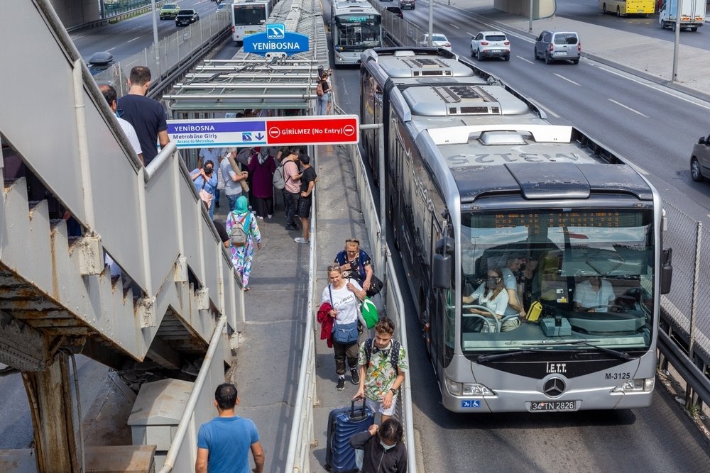 Passengers wait as a bus approaches a metrobus station, in Istanbul, Turkey, July 8, 2022. (Shutterstock Photo)