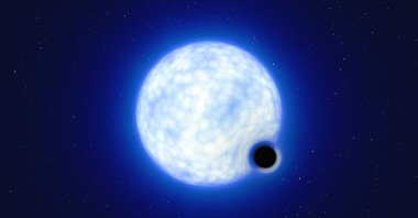 This handout artist’s impression released by The European Southern Observatory (ESO) shows the binary system VFTS 243 composed of a blue star with 25 times the sun’s mass and a black hole. (Photo by European Southern Observatory via AFP)