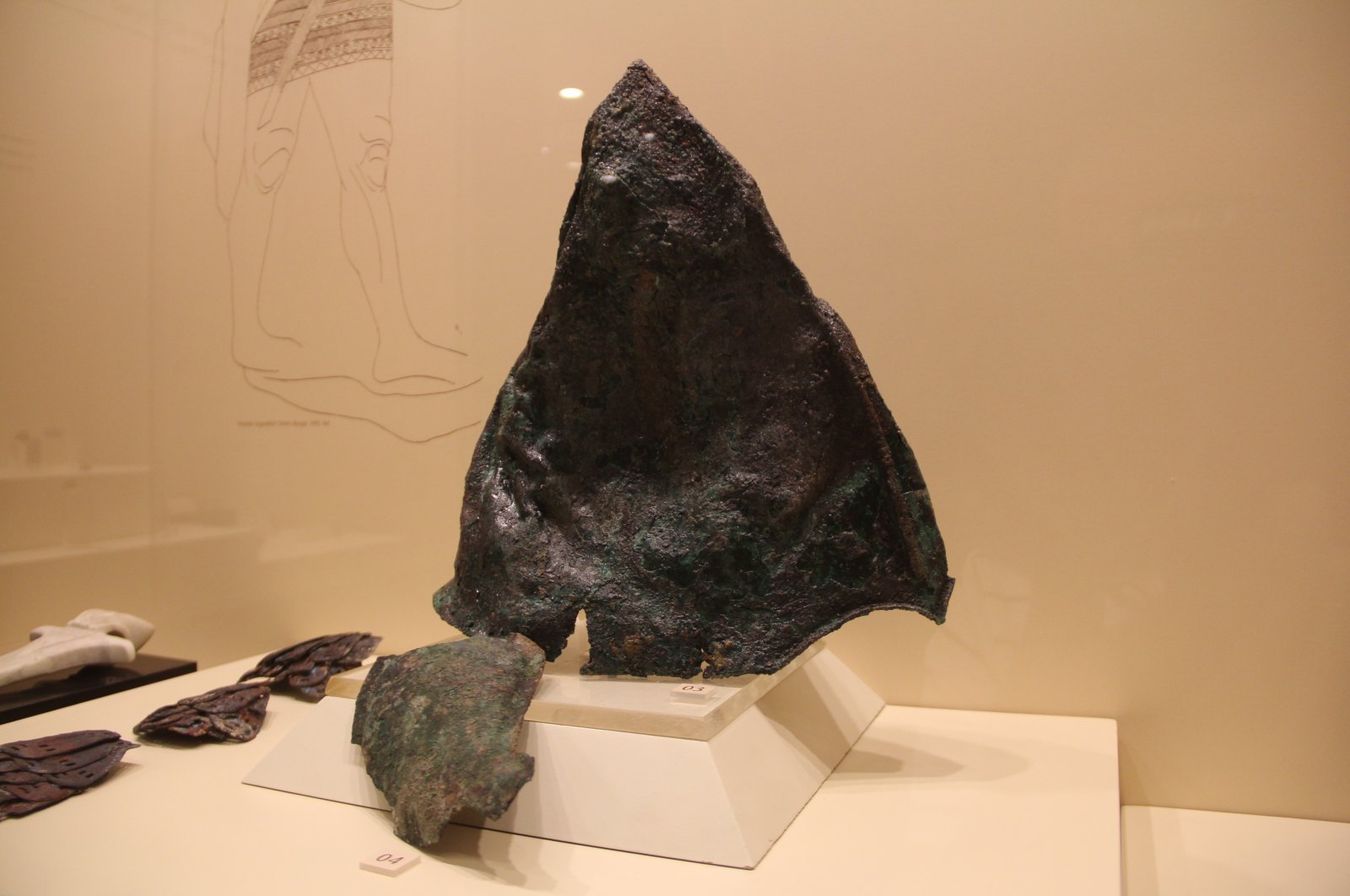 The bronze warrior helmet, which was introduced to the world of science by archaeologist Mustafa Süel in 2002, is displayed in Çorum Museum, Çorum, Turkey, July 17, 2022. (IHA Photo)